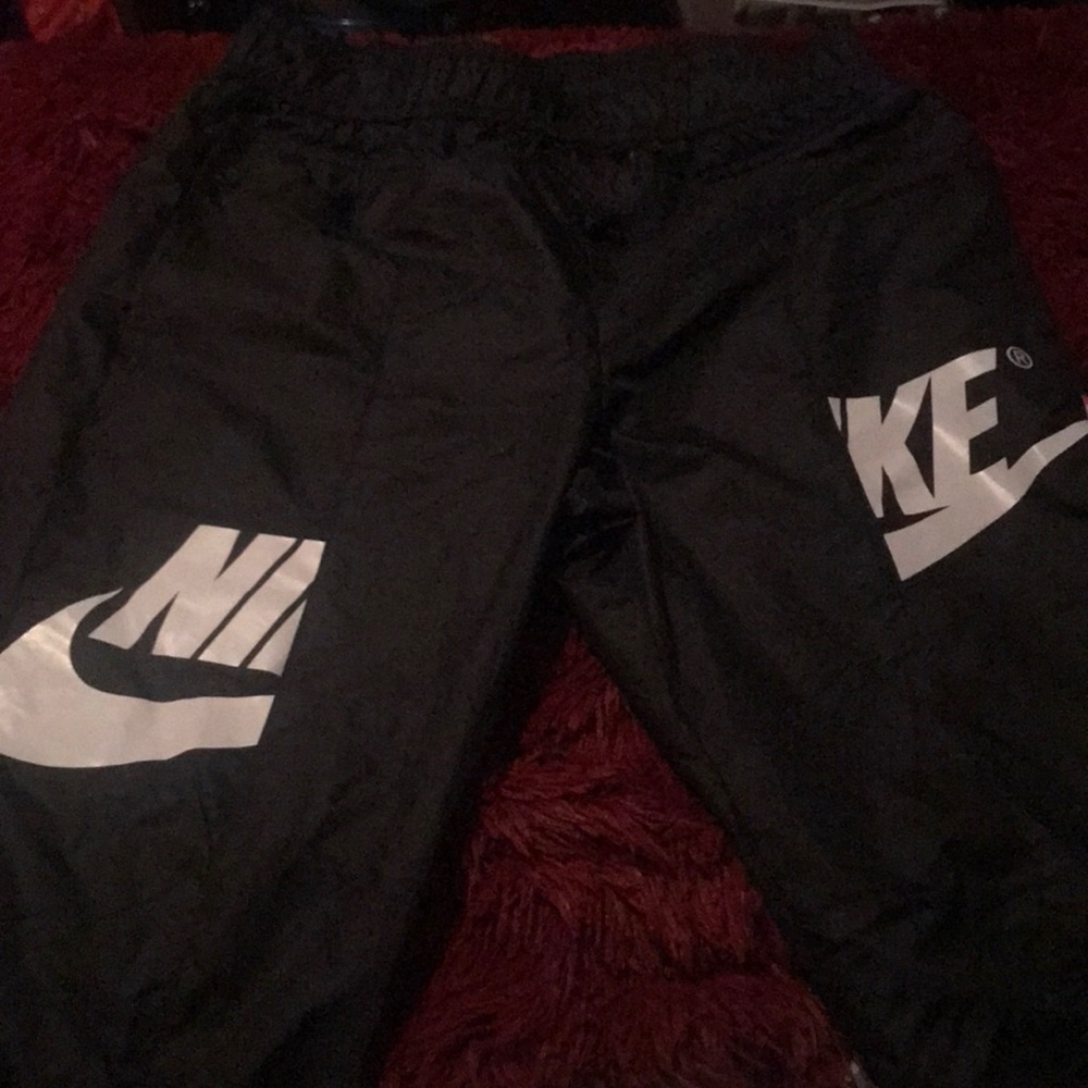 Nike track pants size medium